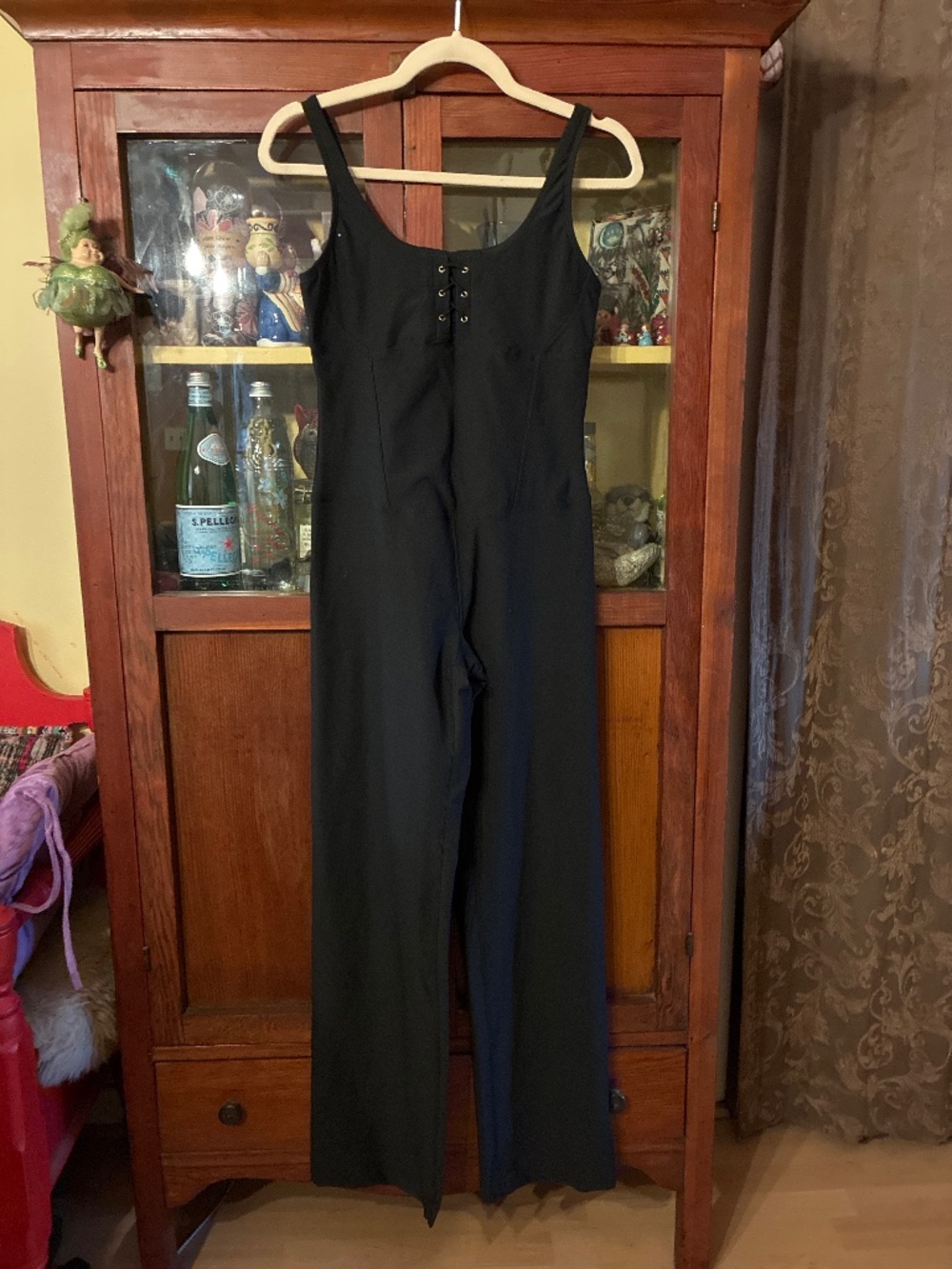 Nike Dri-Fit activewear athleisure flare leg corset style jumpsuit.